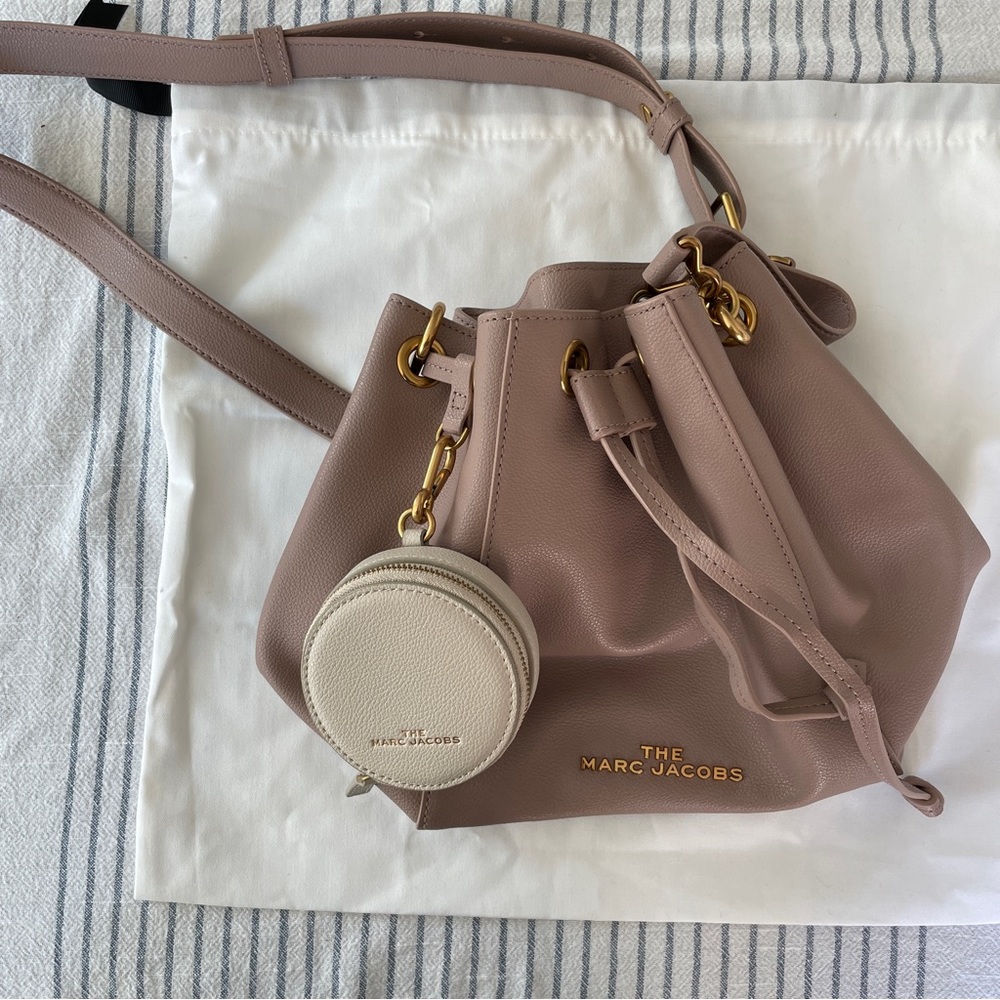The Marc Jacobs Taupe Bucket Bag with Cream coin purse.